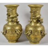A Pair of Chinese Bronze Vases Decorated in Relief with Dragons Chasing Flaming Pearls, 24cm high