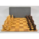 A Vintage German Carved Wooden Chess Set with Eight Fold Wooden Chess Board, 38cm Square