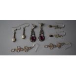 A Collection of Four Pairs of Assorted Silver Earrings