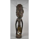 A Carved Tribal Fertility Figure, Papua New Guinea, 72cm high