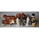 A Collection of Various Animal and Figural Ornaments to include Hereford Bulls, Wedgwood and Co