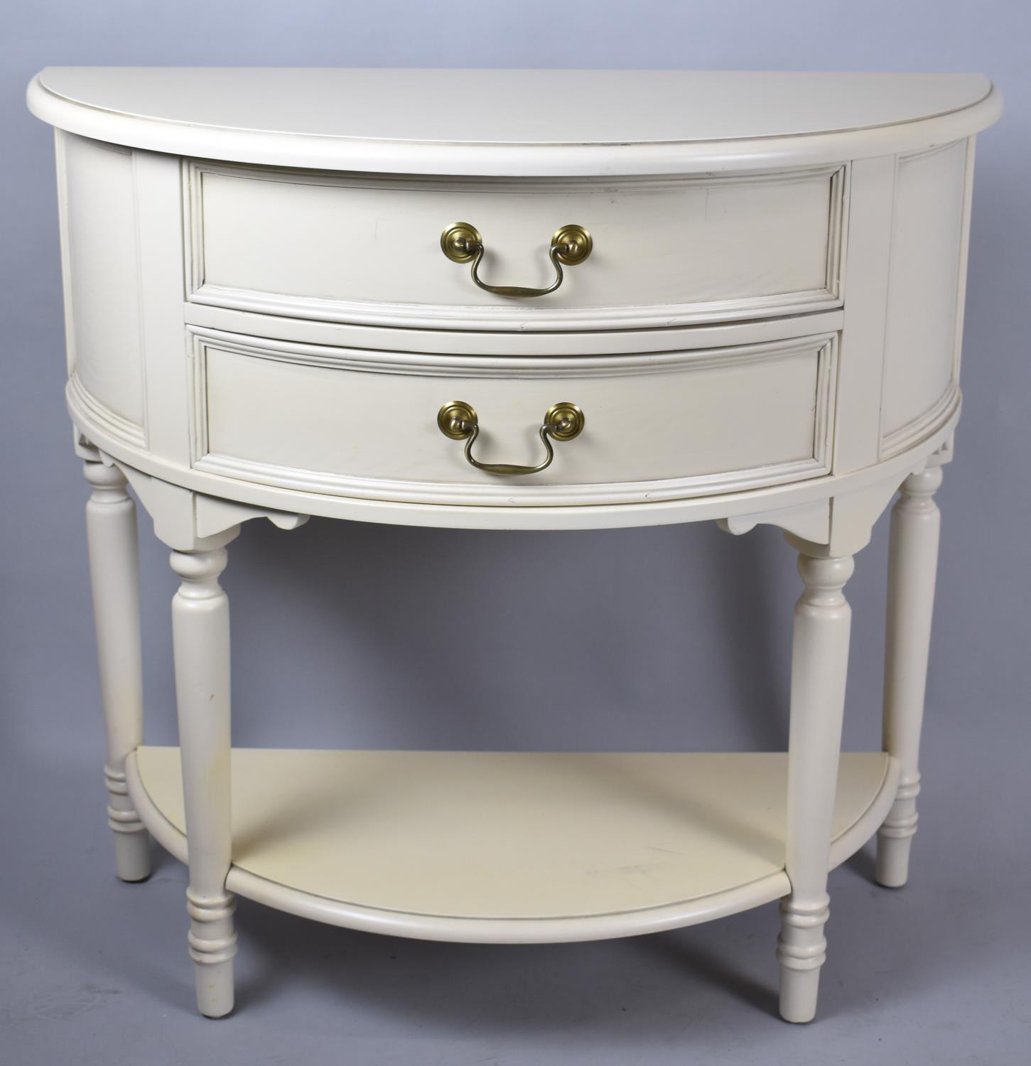A Laura Ashley Cream Painted Demi Lune Side Table with Two Drawers and Stretcher Shelf, 85cm wide