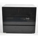 A Modern Feather & Black Three Drawer, 88cm wide