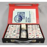 A Modern Cased Mahjong Set with Instruction Booklet