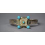A White Metal Cuff with Spinning Compass Having Turquoise Mounts, The Inner Inscribed "Wherever