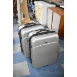 Two Modern Wheeled Suitcases