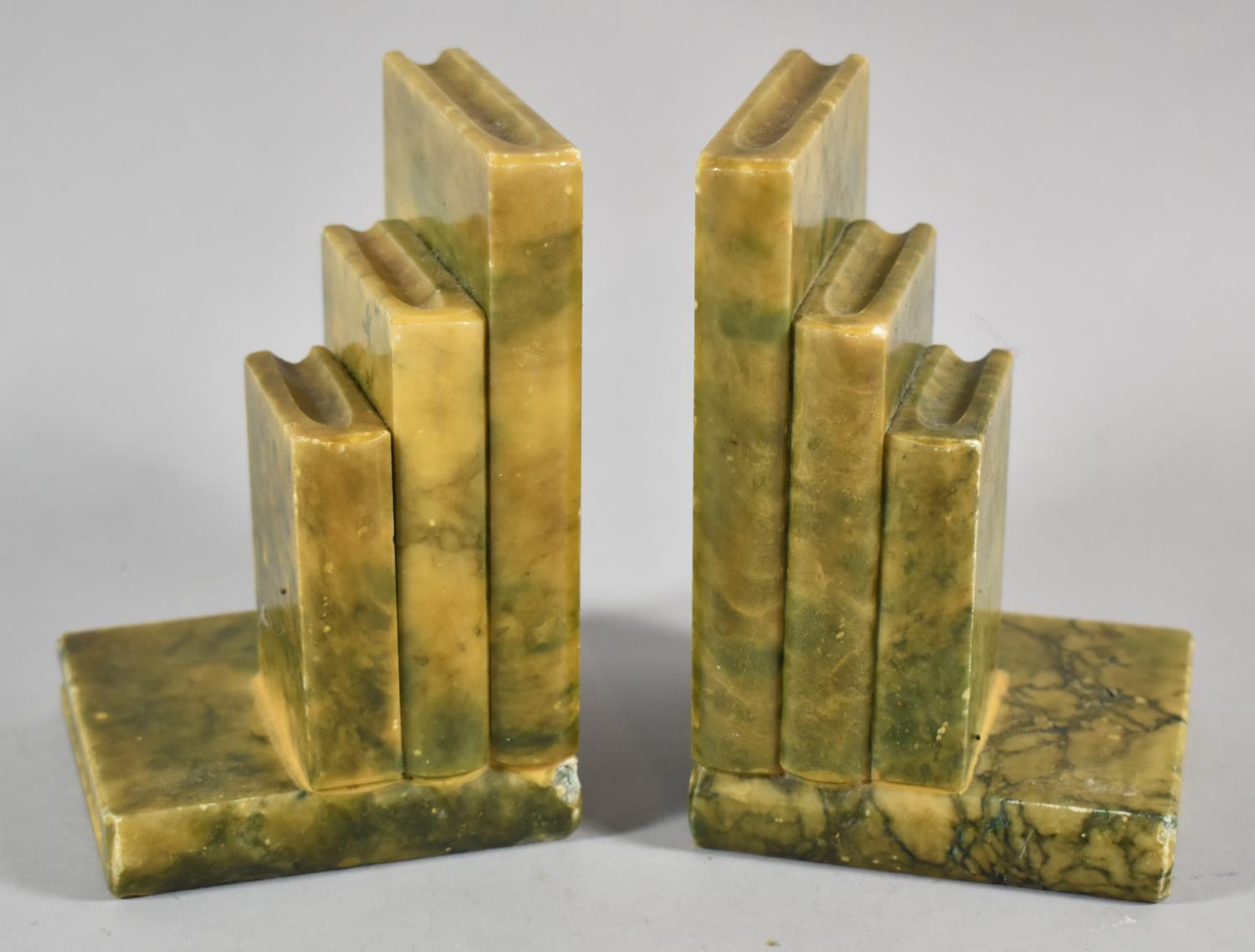 A Pair of Art Deco Alabaster Bookends in the Form of Books, Each 13cm high