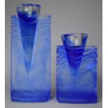 A Pair of Graduated Blue Glass Candle Sticks, 19cm and 28cm high