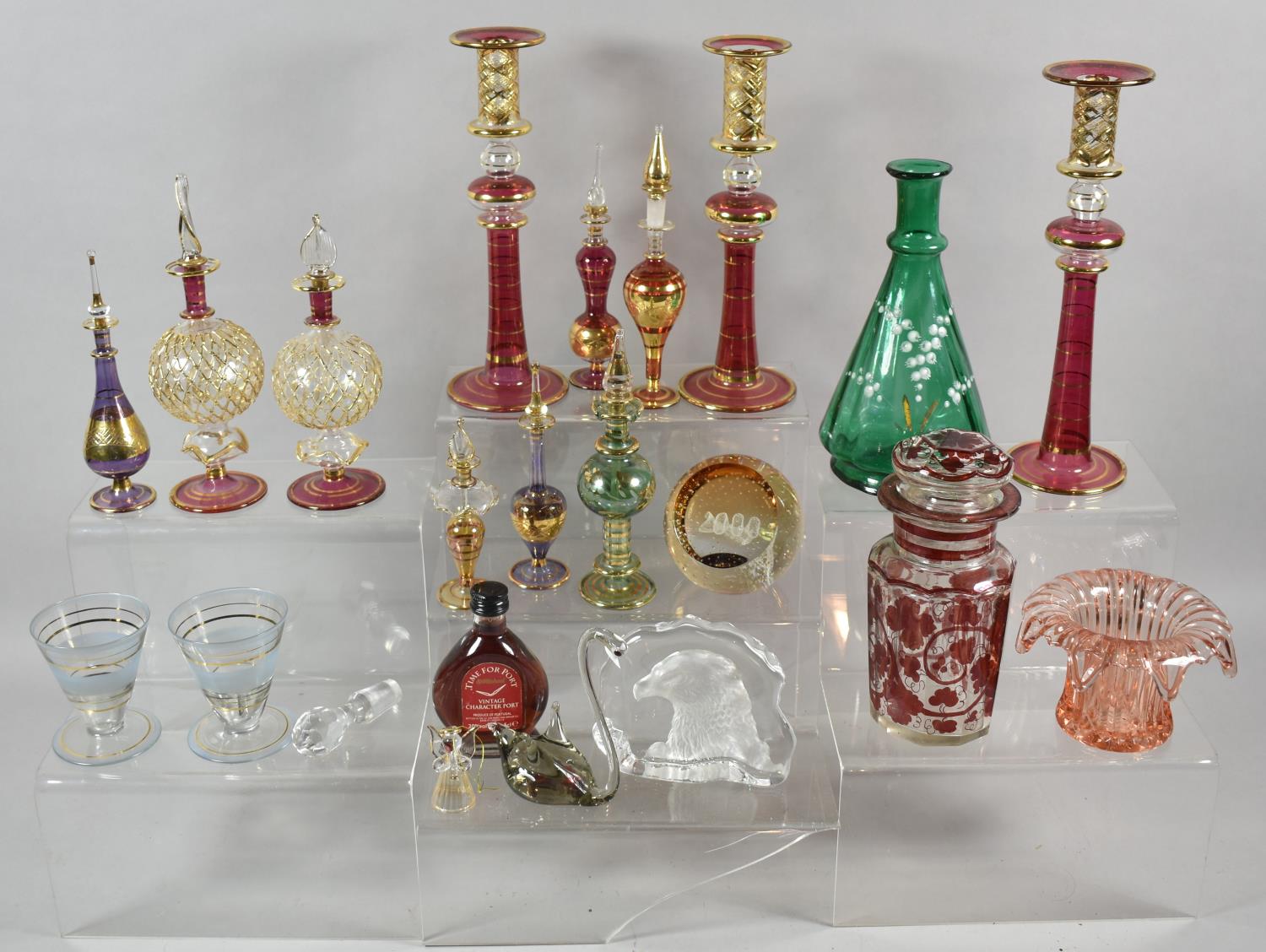 A Collection of Continental Coloured Glass, Perfume Bottles, Candle Sticks, Paperweights etc