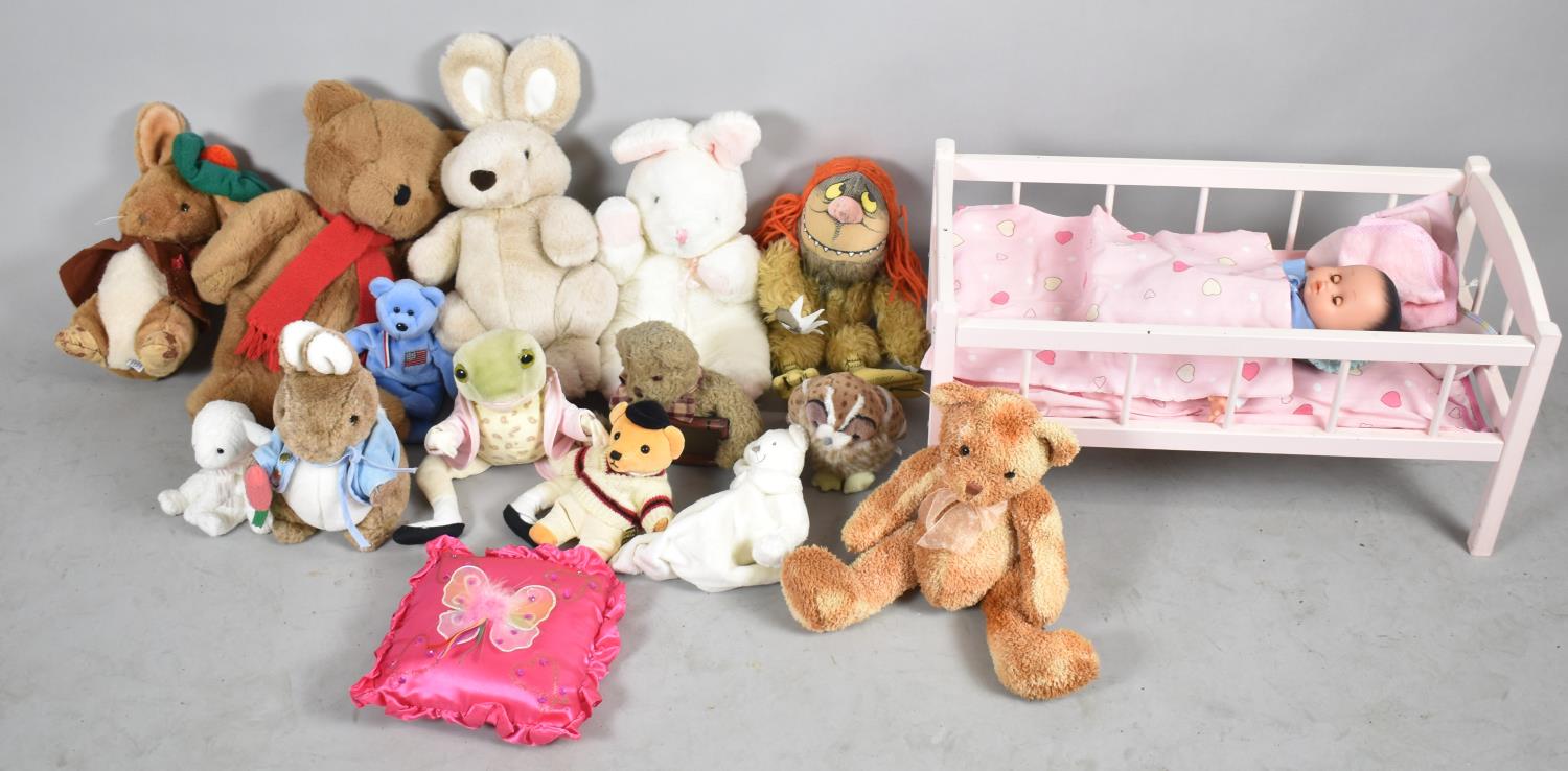 A Collection of Various Soft Toys and Teddy Bears, Dolls Cot etc