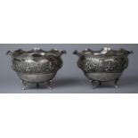 A Pair of Indian White Metal Wavy Rim Bowls on Three Claw Feet, Bodies Decorated in Relief with