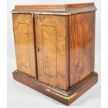 A 19th Century Burr Walnut Four Drawer Collectors Cabinet with Inlaid Hinged Doors and Plinth