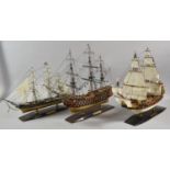 Three Model Ships, Cutty Sark, Royal Sovereign and HMS Victory, the Latter 48cm Long