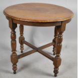 An Edwardian Oak Coffee Table, Turned Supports, 59cm Diameter