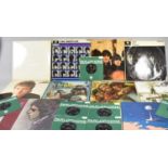 A Collection of Four Beatles LPs and Seven Beatles Singles Together with Other LPS to Include John