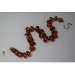 An Amber Necklace, 43cm long