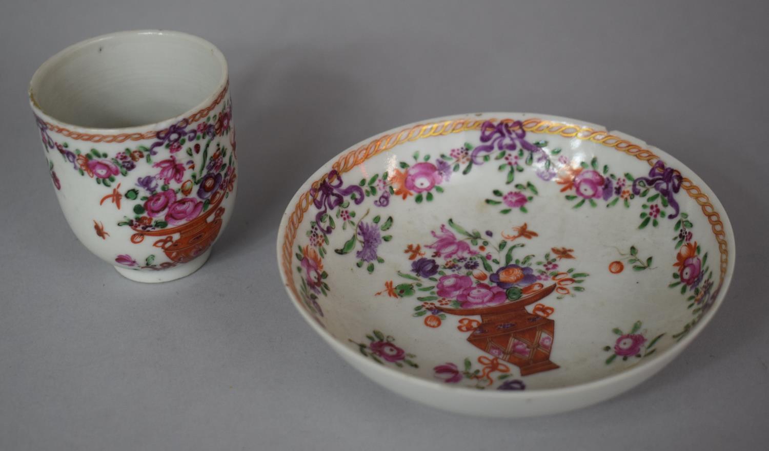 A 18th Century Hand Painted Cabinet Cup and Saucer with Oriental Vase of Flowers and Swag Decoration