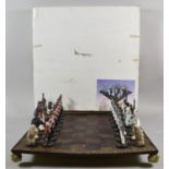 A Modern Cast Resin Napoleonic Chess Set and Board, 45cm Square