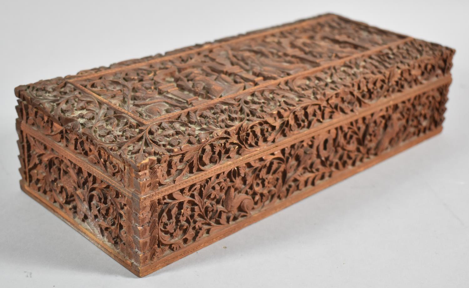 An Ornately Carved North Indian Wooden Box Decorated with Figures, Animals and Foliage, 30cm wide