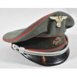 A German Military Cap with Replica SS Insignia