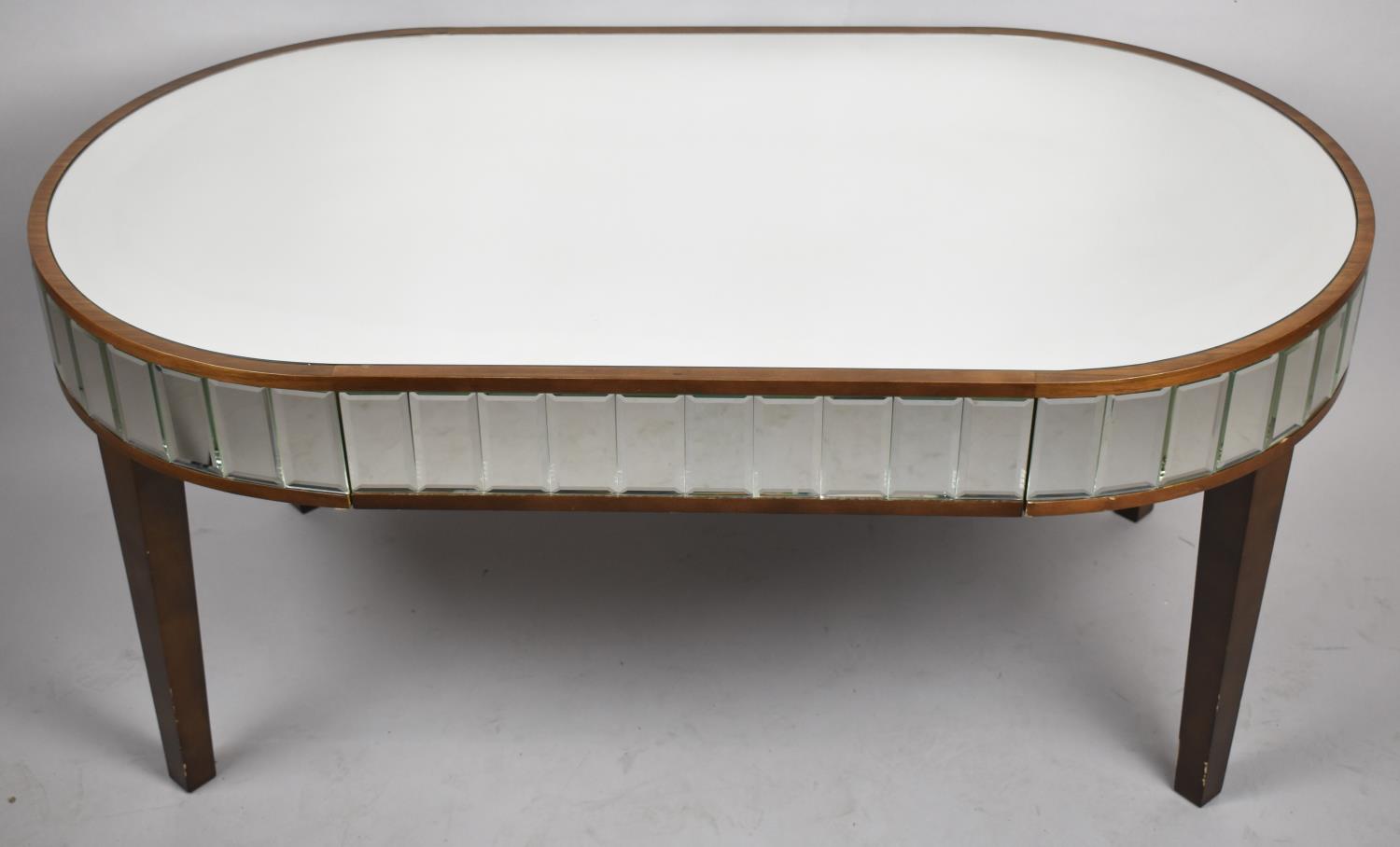 A Modern Mirrored Oval Coffee Table on Square Tapering Legs, 109cm wide