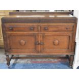 An Edwardian Oak Galleried Sideboard with Two Drawers Over Cupboard Base, One Door Handle Missing,
