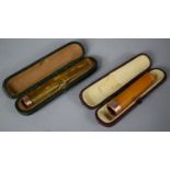 Two 9ct Gold Amber Cheroot Holders, London 1918 and 1907