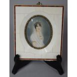 An Ivorine Framed Miniature of Maiden with Headdress and Veil, Signed M Rene