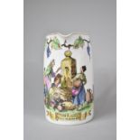 A Hand Painted Spanish Wine Jug Decorated with Transfer Scene Depicting Figures at Water Pump,