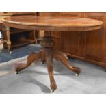 A Late 19th Century Inlaid Oval Snap Top Table on Turned Support with Four Scrolled and Carved Feet,