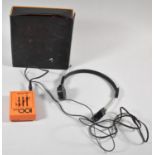 A Vintage Pocket Amplifier with Headphones