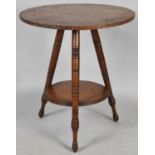 An Edwardian Circular Walnut Occasional Table with Stretcher Shelf, 55cm Diameter