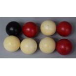 A Collection of Eight Early 20th Century Plain and Coloured Ivory Balls, Each 3cm Diameter
