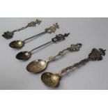 A Collection of Four Thai Silver and White Metal Spoons