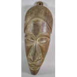A Carved Tribal Wooden Mask, 60cm High