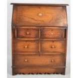 An Edwardian Oak Hall Bureau with Fall Front to Fitted interior and Four Short and One Long Drawers,