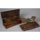 A Small Set of Postage Scales on Mahogany Base, (Missing Weights) together with a Mahogany Cased Set