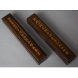 A Pair of Wooden Scroll Weights with Gilded Chinese Characters, 25cm Long