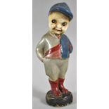 A Painted Plaster Figure of a Jockey, 22cm high