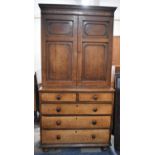 A 19th Century Oak Housekeepers Cupboard, the Base with Two Short and Three Long Drawers, Top