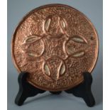 A Circular Copper Arts and Crafts Disk, 13.5cm Diameter