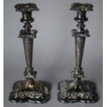 A Pair of Sheffield Plate Candlesticks, 31cm high