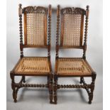 A Pair of Late 19th Century Oak Framed Gothic Revival Barley Twist Hall Side Chairs with Cane Seat