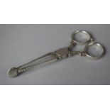 A Pair of Silver Sugar Tongs, 10cm long