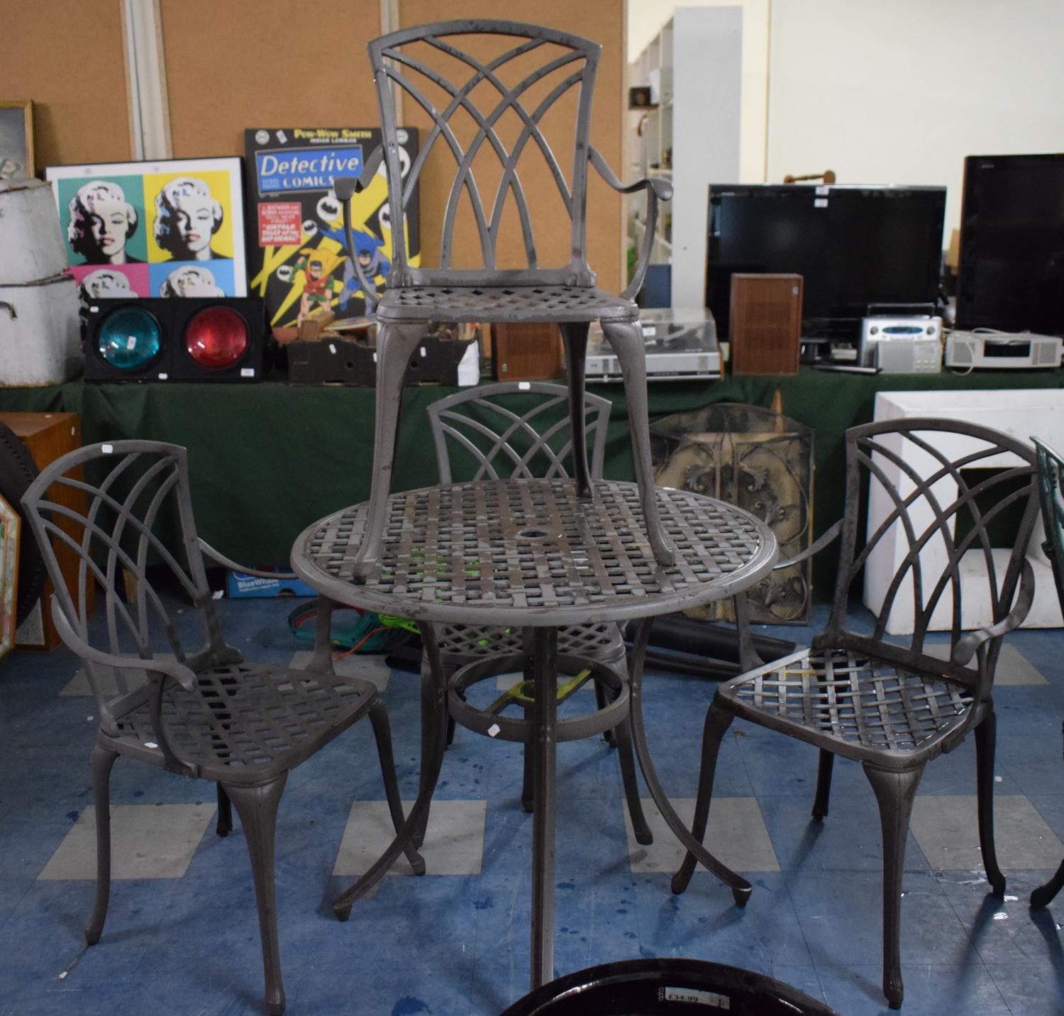 A Metal Patio Set Comprising Circular Table, 83cm Diameter and Four Arm Chairs