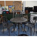 A Metal Patio Set Comprising Circular Table, 83cm Diameter and Four Arm Chairs