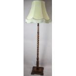 An Edwardian Oak Barley Twist Standard Lamp with Stepped Square Plinth Base