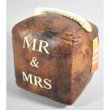 A New and Unused Leather Door Stop Inscribed "Mr & Mrs", 16cm Cube