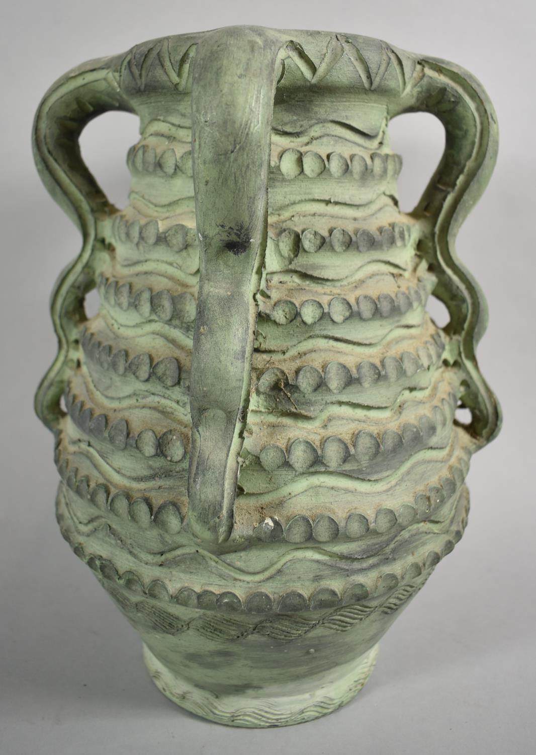 A Green Glazed Stoneware Four Handled Studio Pottery Vase, Unsigned, 31cm high