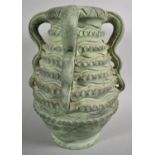 A Green Glazed Stoneware Four Handled Studio Pottery Vase, Unsigned, 31cm high